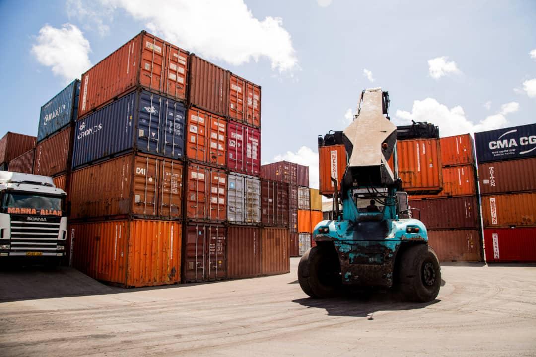 Reach stacker moving through the container yard
